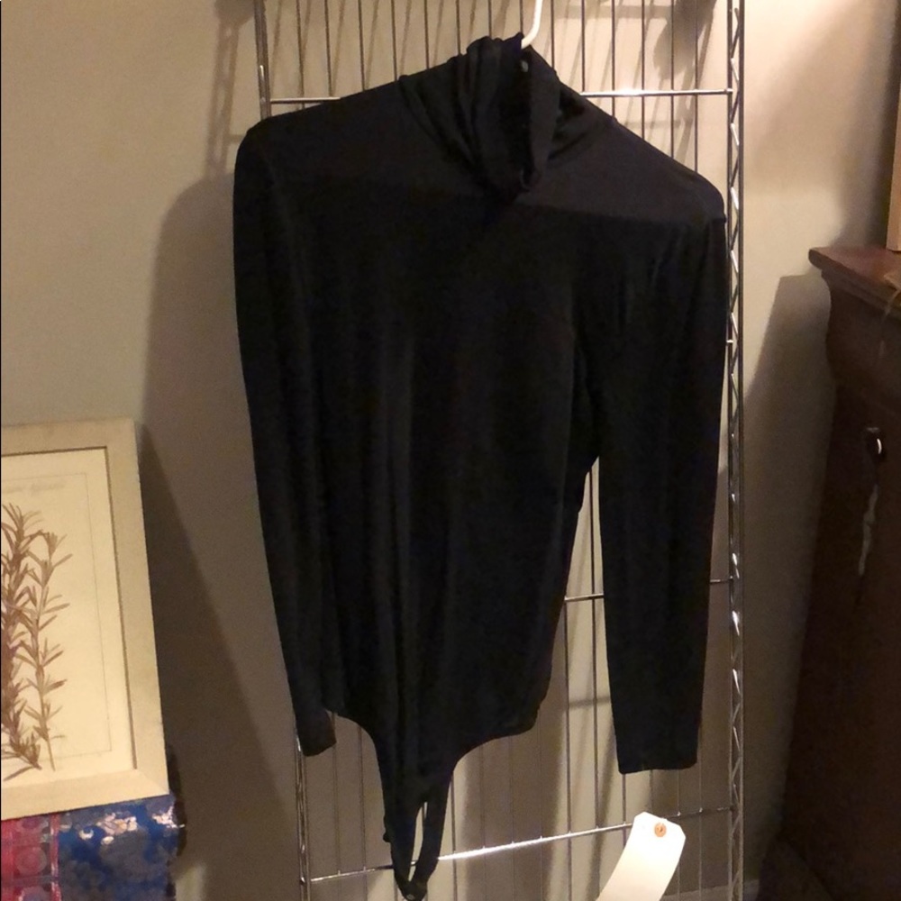 Black turtle neck jumpsuit